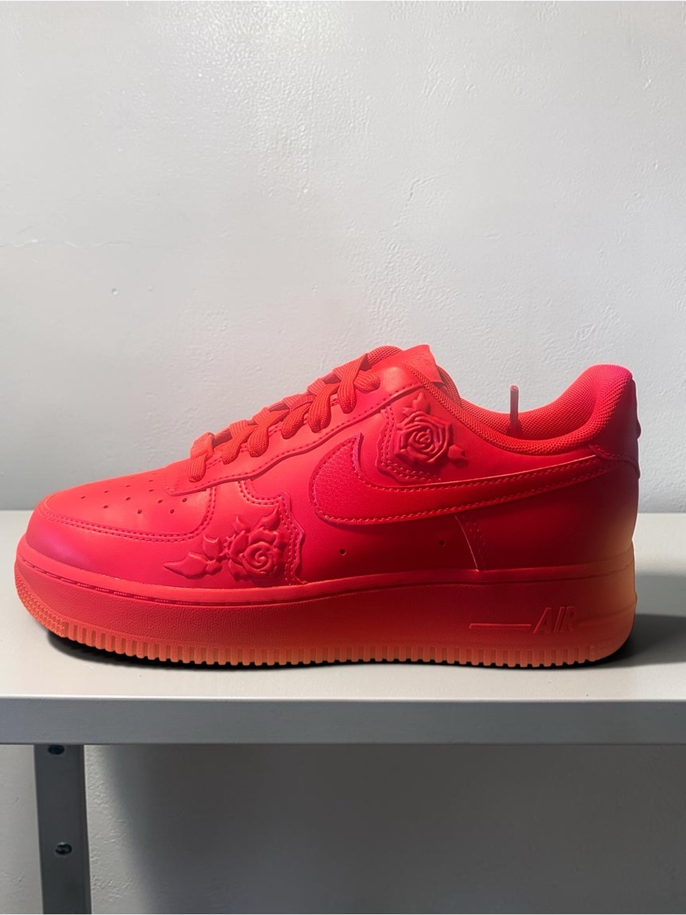 Nike Air Force 1 “07” 
Low-Top Sneakers in Vibrant Red with Rose Emboss